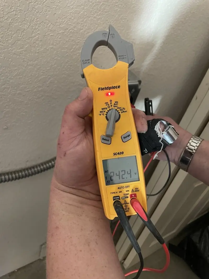 Voltage testing with clamp meter during Aluminum Wiring Replacement in Woods Creek
